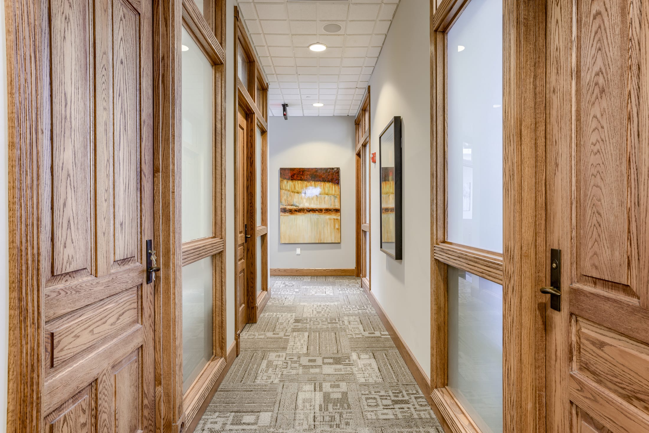 Wood-paneled tenant corridor
